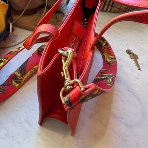 Elegant Red Shoulder Bag with Gold Accents